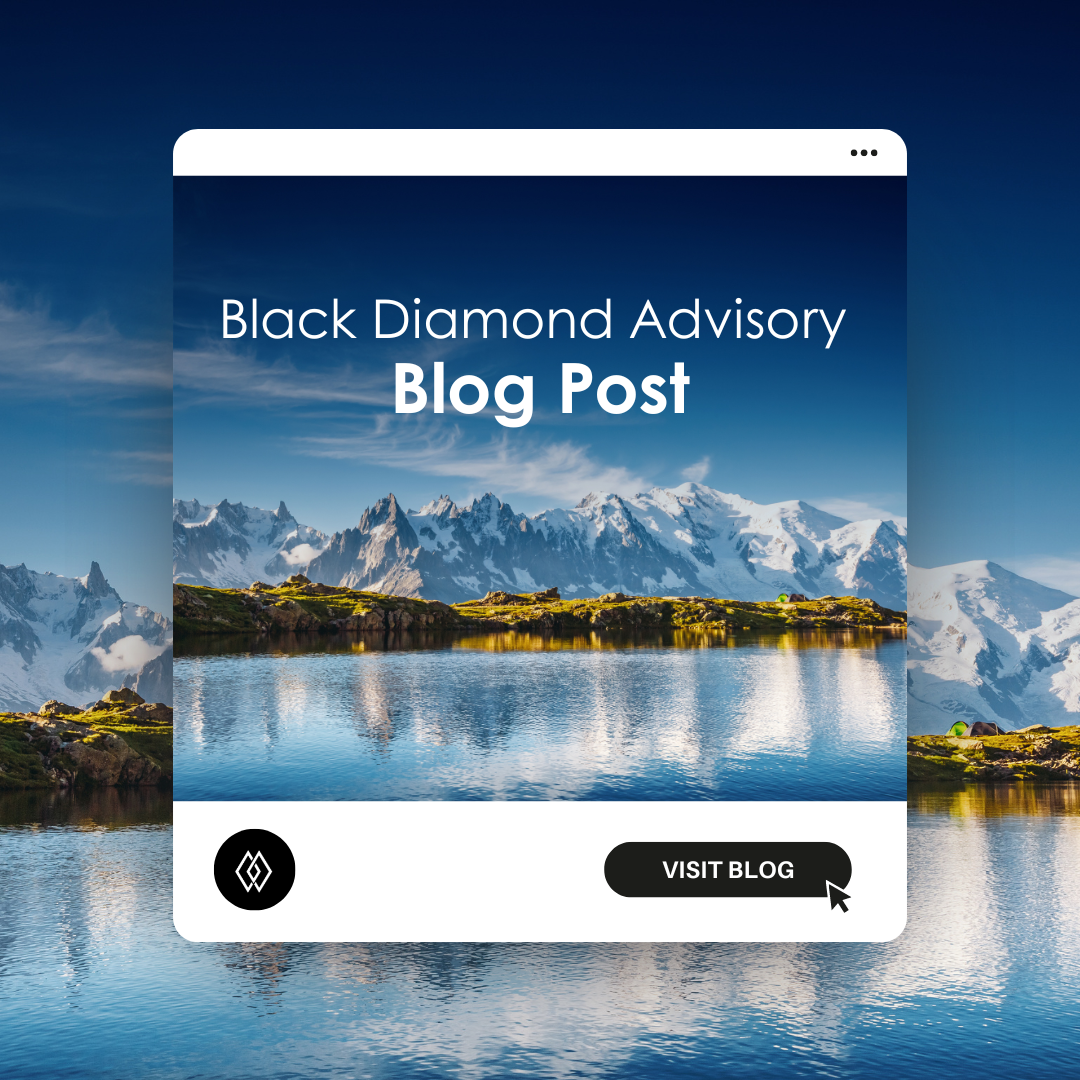 glassy lake at the edge of a grassy riverbank and pointy snowy mountains in the background with overlay title of black diamond blog post