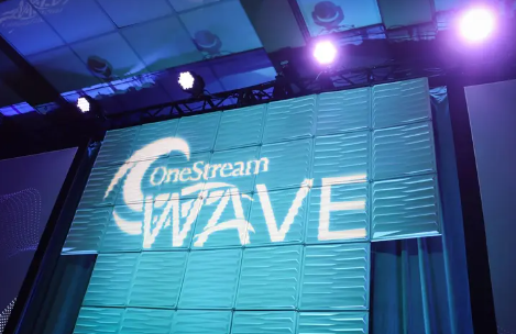 words onestream wave projected on blue textured wall