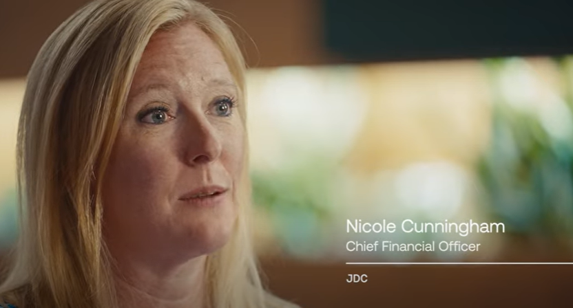still from a video showing nicole cunningham and an out of focus background